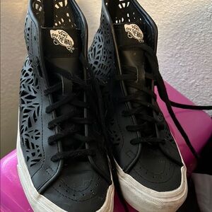 Vans Black High-Top Sneakers with Intricate Design
